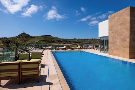 2 piscinas al aire libre. Reef Hotel & Spa