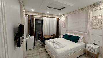 Suite, City View | 1 bedroom, desk, laptop workspace, free WiFi