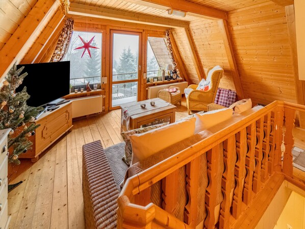 Casa Elite, 2 habitaciones | Sala de estar | Chimenea