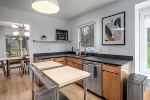 Fridge, microwave, stovetop, dishwasher - Stylish Ranch with Fenced Yard & Peloton Bike (Durham)