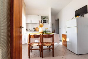 Apartment, 1 Bedroom, Patio, Garden View | Dining room - Bright Villa Flat With Shared Garden (San Michele al Tagliamento)