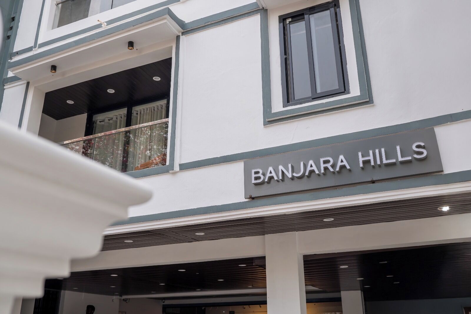 A multi-story building with a sign reading 'BANJARA HILLS'.