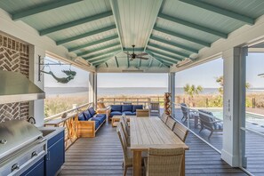 Outdoor dining - Oceanfront Luxury Living Private Pool, Private Beach Access by Tybee Cottages (Tybee Island)