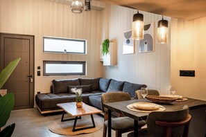 Deluxe loft | Woonruimte | Flatscreentelevisie
