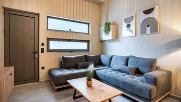 Deluxe Loft | Living area | Flat-screen TV