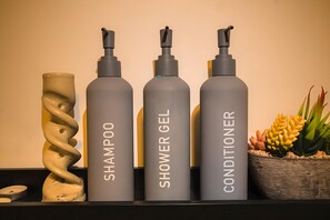 Hair dryer, towels, soap, toilet paper