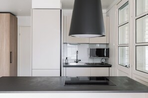 Superior Apartment, Kitchen, City View | Private kitchen | Full-size fridge, microwave, oven, stovetop