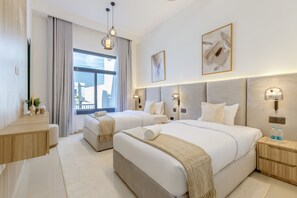 6 chambres, coffres-forts dans les chambres, fer et planche à repasser