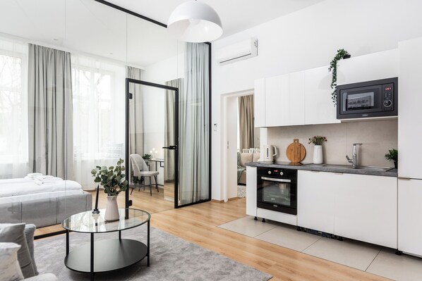 Superior Apartment, City View | Private kitchenette | Full-sized fridge, microwave, oven, stovetop - Modern Apartments by Upstairs (Kraków)