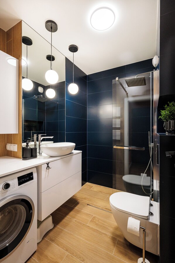 Superior Apartment, Balcony | Bathroom | Shower, hair dryer, towels, soap