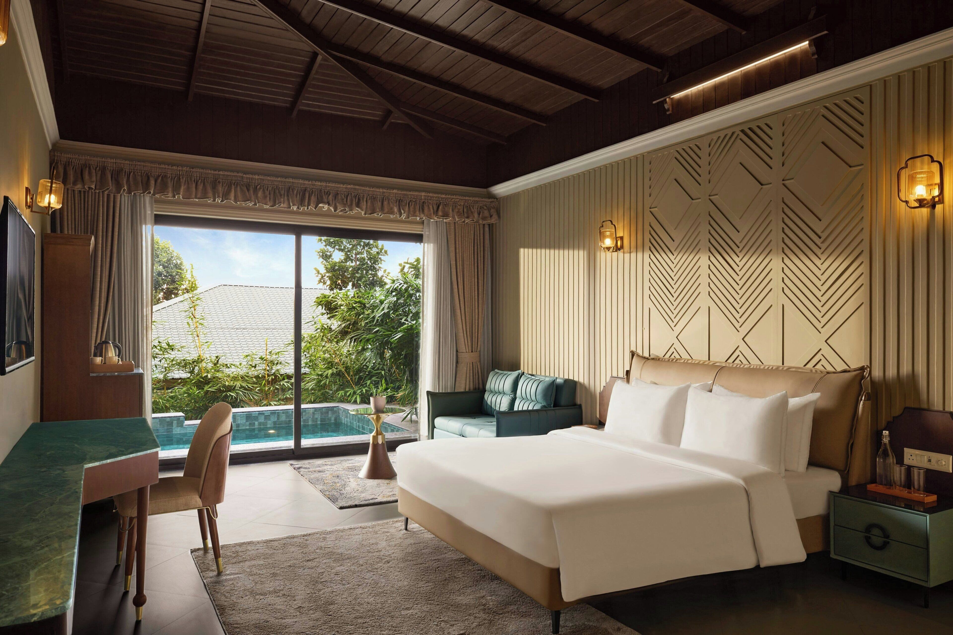 Premium Room, 1 King Bed, Garden View | Pool | Outdoor pool, pool umbrellas