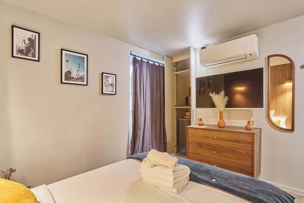 1 chambre, fer et planche à repasser, Wi-Fi, literie fournie