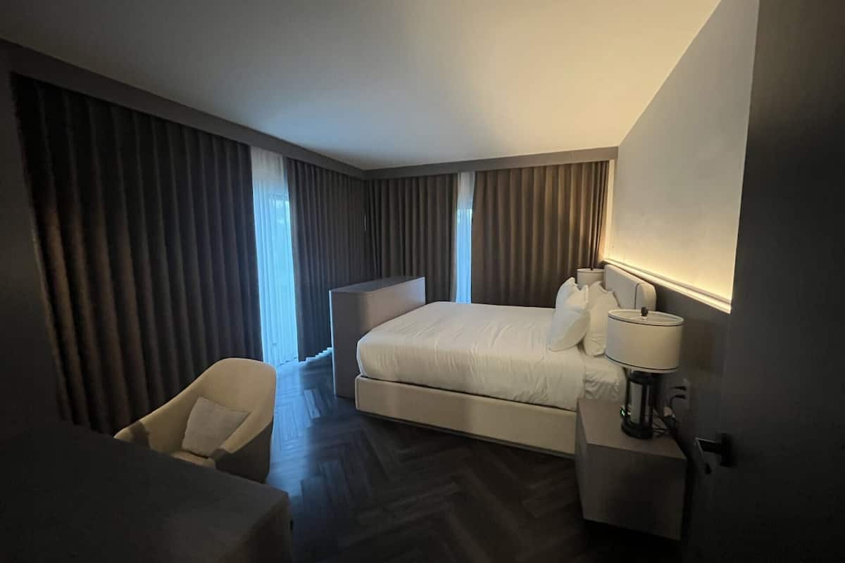 Luxury Suite, Balcony, Beach View | 1 bedroom, in-room safe, desk, laptop workspace
