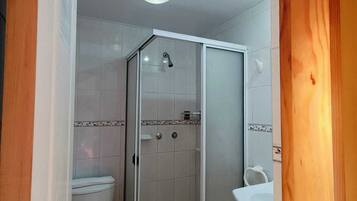 Family Triple Room | Bathroom | Shower, towels, soap, toilet paper