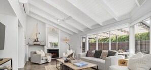 Smart TV, fireplace, DVD player, books