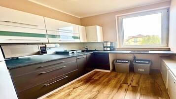 Fridge, microwave, stovetop, coffee/tea maker