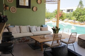 Deluxe Apartment, Pool View | Terrace/patio - Maria Apartments by Checkin (Hersonissos)