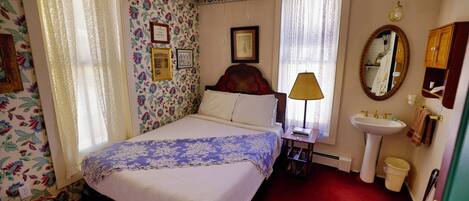 1 habitación, tabla de planchar con plancha, cuna de viaje y wifi