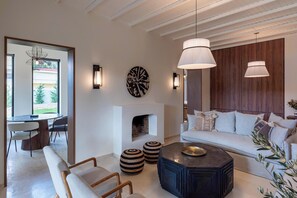 Villa, Pool View | Living room | 40-inch Smart TV with satellite channels, Netflix, streaming services