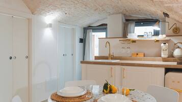 Luxury Studio Suite | Private kitchen | Espresso maker, coffee/tea maker, electric kettle