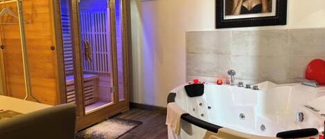 Suite Luxe | Coin séjour | Télévision