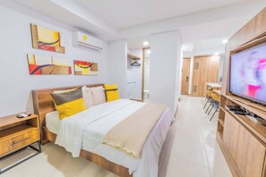 Fer et planche à repasser, lit parapluie, Wi-Fi, draps fournis