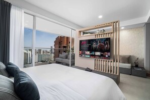 1 habitación, tabla de planchar con plancha, cuna de viaje y wifi
