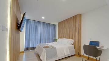 1 dormitorio, tabla de planchar con plancha, wifi y ropa de cama