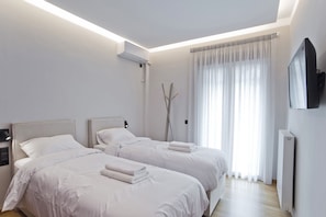 2 habitaciones, tabla de planchar con plancha, wifi y ropa de cama 