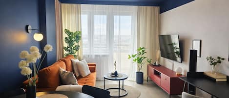 Superior Apartment, Balcony, City View | Living room | 50-inch Smart TV with cable channels, Netflix, streaming services