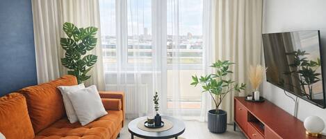 Superior-Apartment, Balkon, Stadtblick | Wohnzimmer