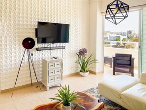 TV, offices - Golf Course View Apartment in Mazatlan (Mazatlan)