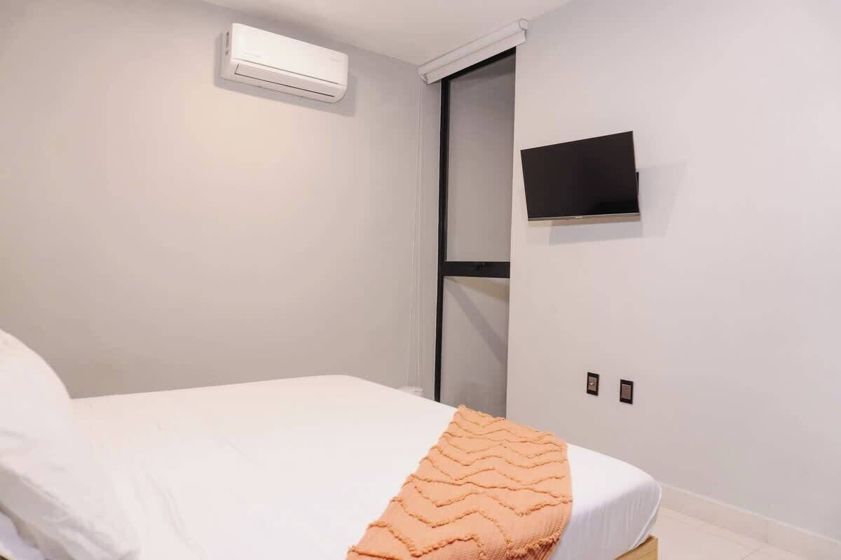 2 slaapkamers, een strijkplank/strijkijzer, gratis wifi, beddengoed