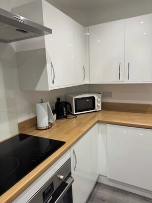 Apartment | Private kitchen | Fridge, microwave, oven, stovetop