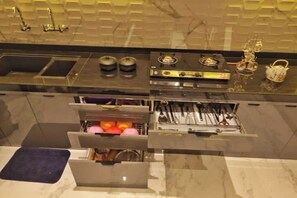 Fridge, microwave, stovetop, coffee/tea maker