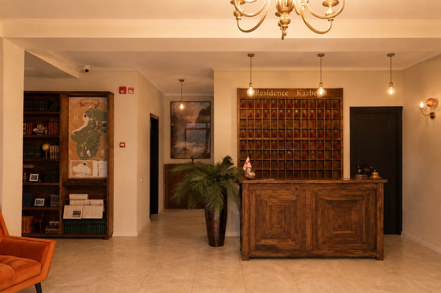 A reception area with a wooden desk, a map on the wall, and a bookshelf filled with books.