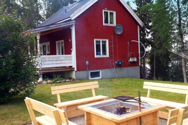 House in summer with fireplace