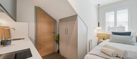 1 slaapkamer, een strijkplank/strijkijzer, gratis wifi, beddengoed