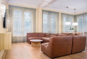 Apartment | Living area | 45-inch plasma TV with cable channels