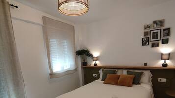 2 slaapkamers, een strijkplank/strijkijzer, gratis wifi, beddengoed