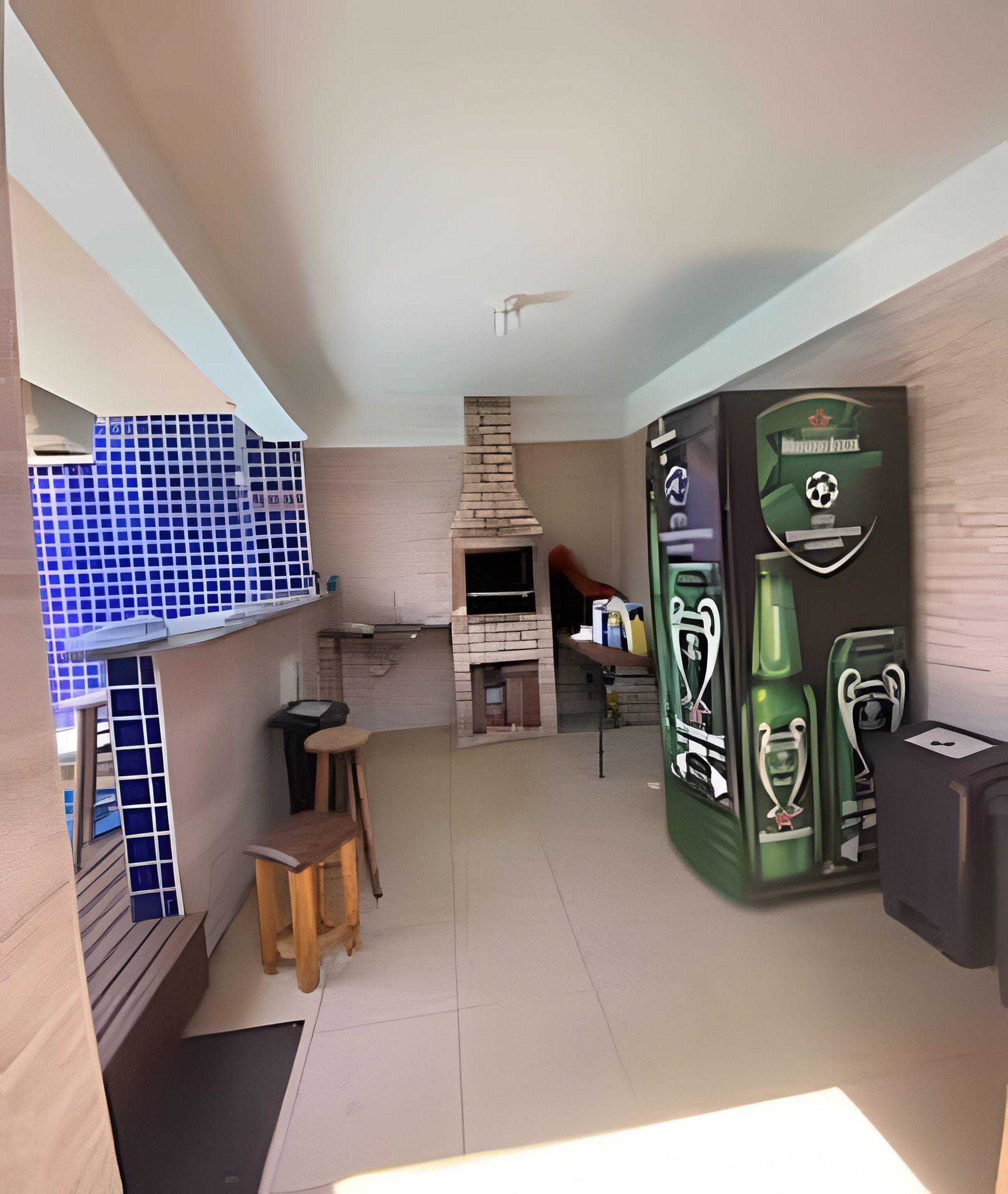 A modern kitchen with a built-in oven, a dining area with stools, and a large green appliance unit.