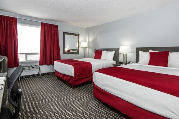 Unit with 2 Queen beds. Exact unit will be assigned upon arrival. Views, colors, and decor may vary.