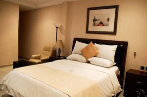 Deluxe Room, Balcony, City View | Desk, laptop workspace, blackout drapes, soundproofing - Brava Hotel (Ibadan)