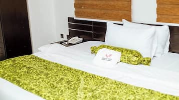 Deluxe Room, Balcony, City View | Desk, laptop workspace, blackout drapes, soundproofing