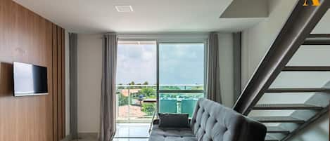 Apartment | Living area | 42-inch flat-screen TV with digital channels