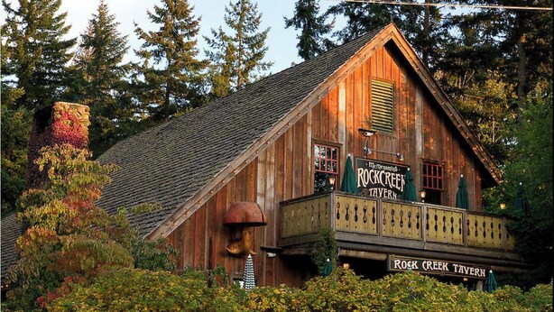 A rustic wooden building with a sign reading "Rock Creek Tavern." - Remodeled! Beaverton 2BR/2BA Fenced Backyard Extended Stays (Beaverton)