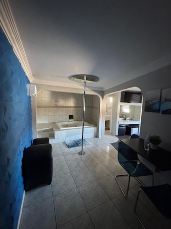 Minibar, desk, blackout drapes, iron/ironing board