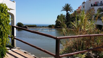 Enjoy views, Capistrano Playa 709, right above Burriana beach, Nerja