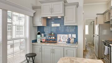 Fridge, microwave, stovetop, coffee/tea maker