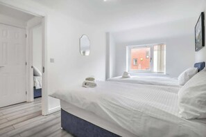 3 bedrooms, desk, iron/ironing board, travel cot